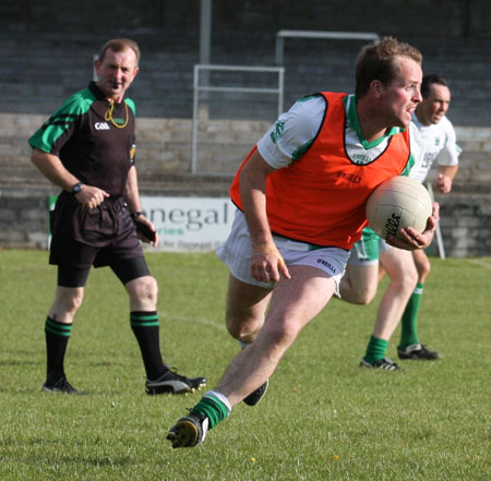 Action from the senior secondary league game against Naomh Brd.