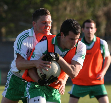 Action from the senior secondary league game against Naomh Brd.