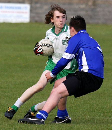 Action from the under 14 league game against Four Masters.