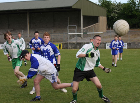 Action from the under 14 league game against Four Masters.