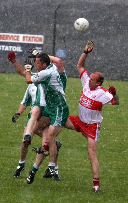 Action from the Junior B championship play-off against Glenfin.