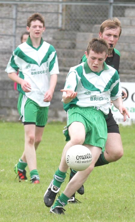 Action from the senior reserve division two match against Fanad Gaels.