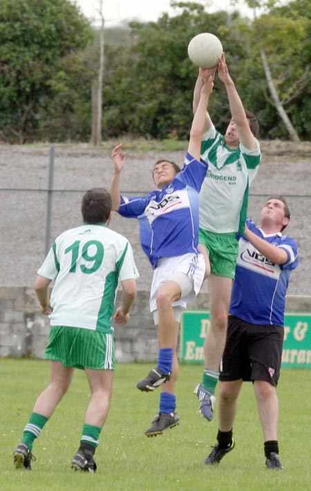 Action from the senior reserve division two match against Fanad Gaels.