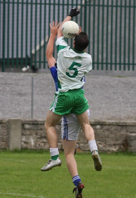 Action from the senior reserve division two match against Fanad Gaels.