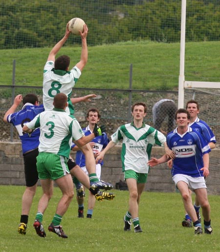 Action from the senior reserve division two match against Fanad Gaels.