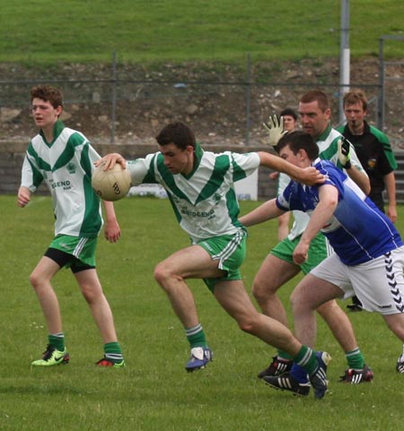 Action from the senior reserve division two match against Fanad Gaels.