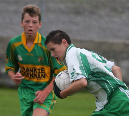 Action from the minor championship quarter-final between Aodh Ruadh and Four Masters.