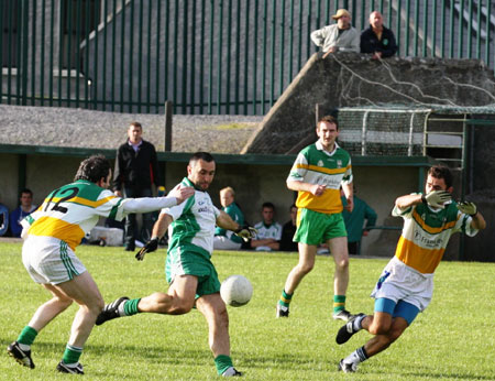 Action from the senior reserve division two match against Kilcar.