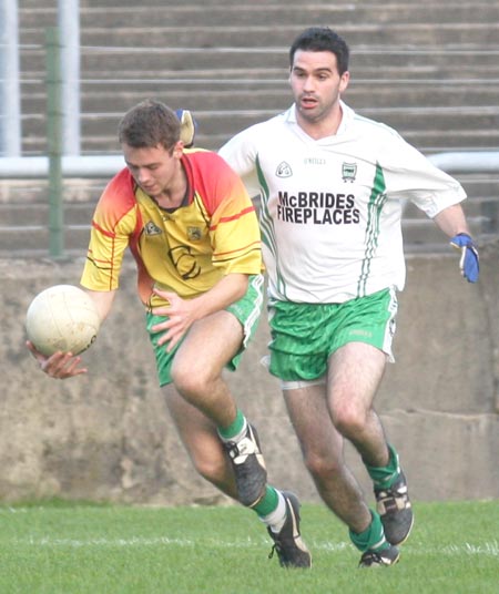 Action from the senior  division two match against MacCumhaill's.