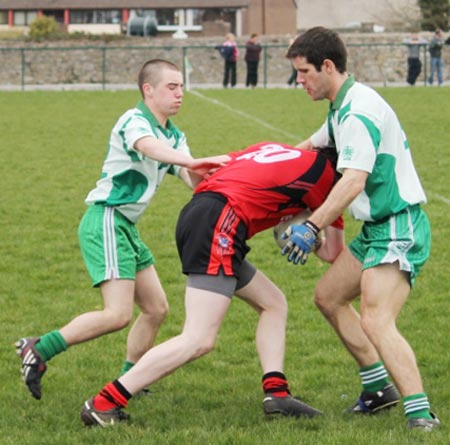 Action from the reserve senior division three match against Naomh Bríd.