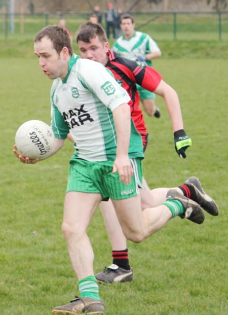 Action from the reserve senior division three match against Naomh Bríd.