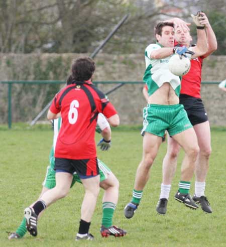 Action from the reserve senior division three match against Naomh Bríd.