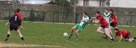 Action from the reserve senior division three match against Naomh Bríd.