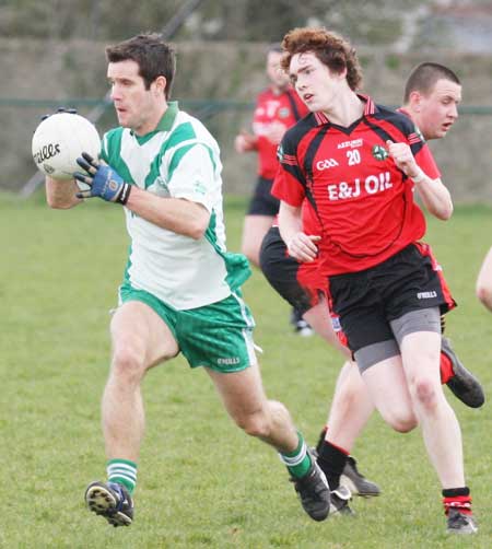 Action from the reserve senior division three match against Naomh Bríd.