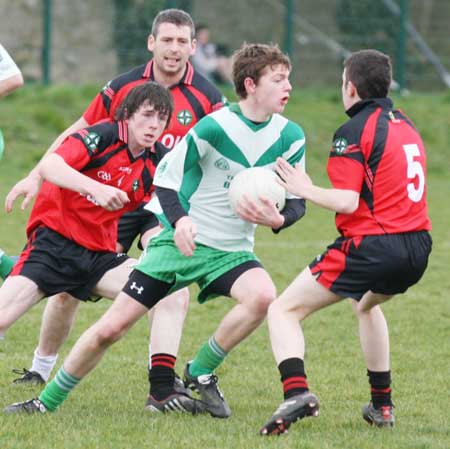 Action from the reserve senior division three match against Naomh Bríd.