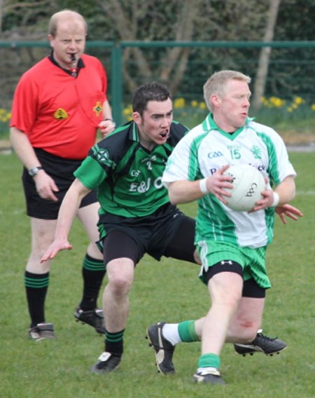 Action from the reserve senior division three match against Naomh Bríd.