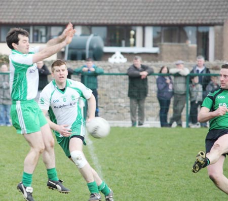 Action from the reserve senior division three match against Naomh Bríd.