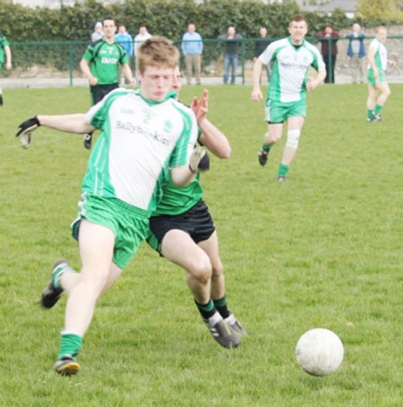 Action from the reserve senior division three match against Naomh Bríd.