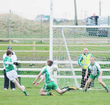 Action from the senior division three match against Naomh Mhuire.