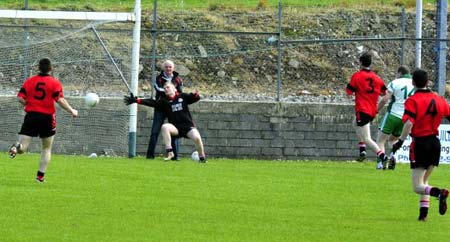 Action from the senior reserve division three match against Urris.