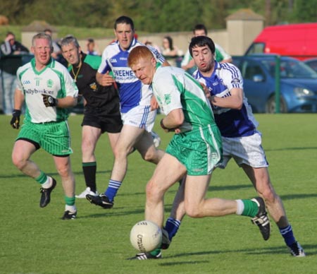 Action from the intermediate championship play-off match against Fanad Gaels.