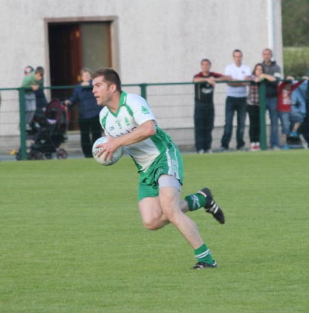 Action from the intermediate championship play-off match against Fanad Gaels.