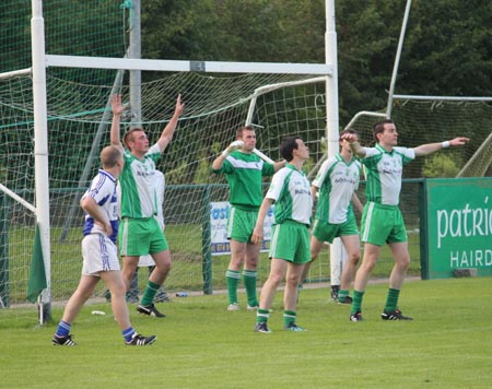 Action from the intermediate championship play-off match against Fanad Gaels.