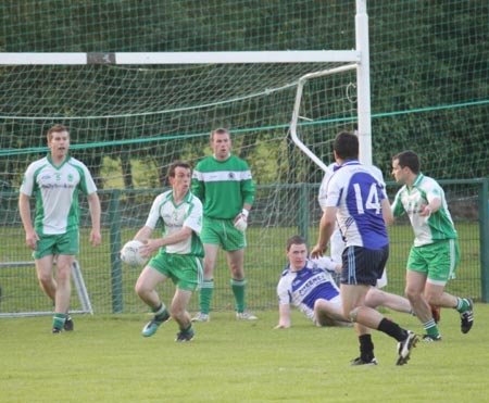 Action from the intermediate championship play-off match against Fanad Gaels.