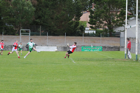 Action from the under 14 match against Dungloe.