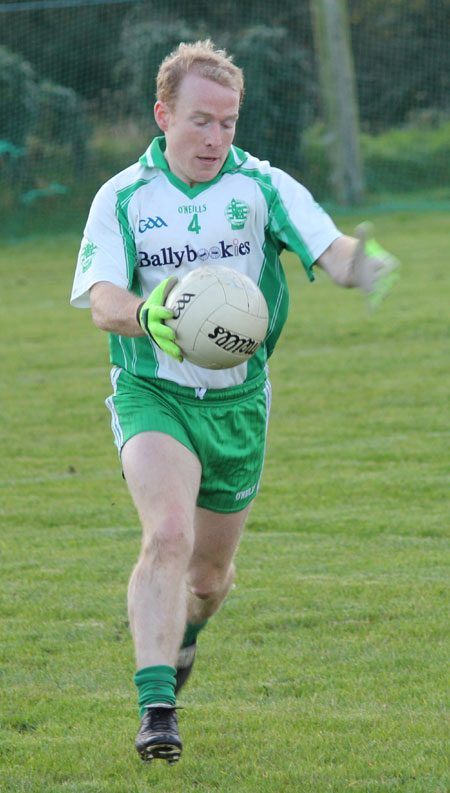 Action from the division three football league match against Urris.