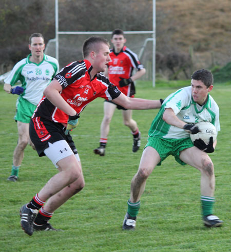 Action from the division three football league match against Urris.