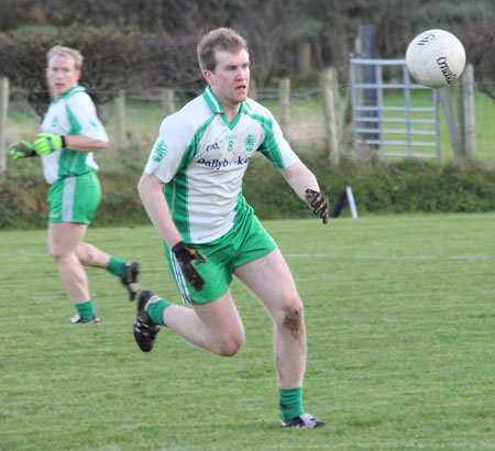 Action from the division three football league match against Urris.