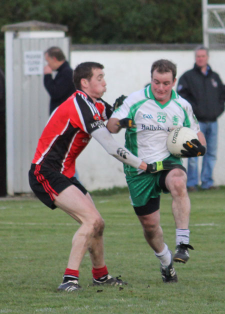 Action from the division three football league match against Urris.