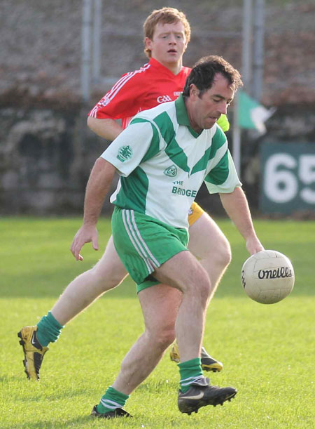 Action from the Senior Reserve Football Division 3 match against Naomh Colmcille.