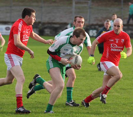 Action from the division three football league match against Naomh Cholmcille.