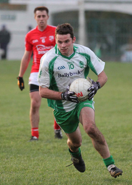 Action from the division three football league match against Naomh Cholmcille.