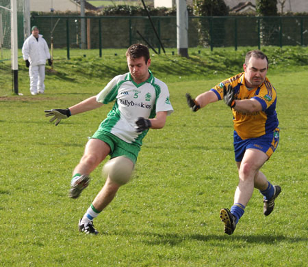 Action from the division three football league match against Burt.