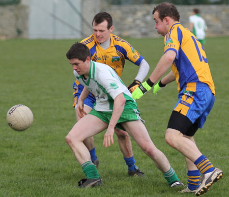 Action from the division three football league match against Burt.