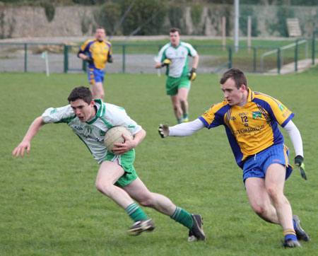 Action from the division three football league match against Burt.