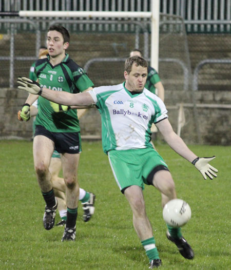 Action from the division three football league play-off match against Naomh Bríd.