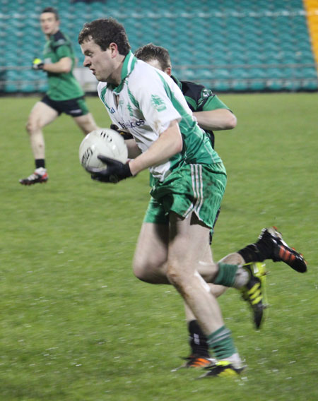 Action from the division three football league play-off match against Naomh Bríd.