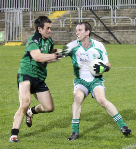 Action from the division three football league play-off match against Naomh Bríd.