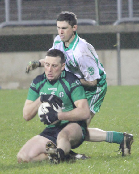 Action from the division three football league play-off match against Naomh Bríd.