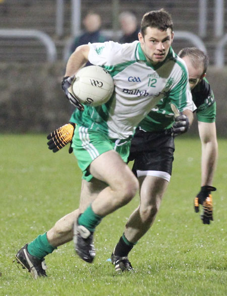 Action from the division three football league play-off match against Naomh Bríd.