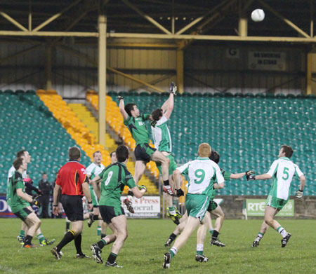 Action from the division three football league play-off match against Naomh Bríd.