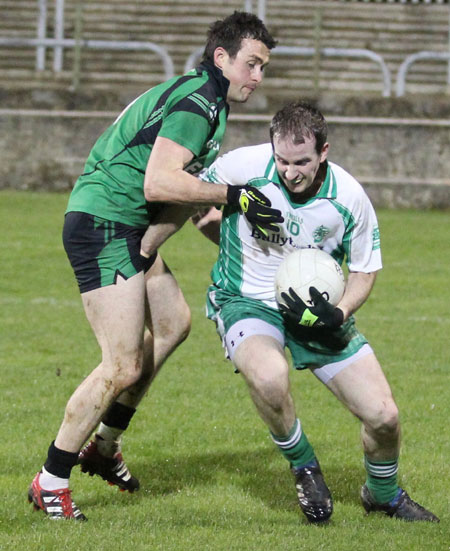 Action from the division three football league play-off match against Naomh Bríd.