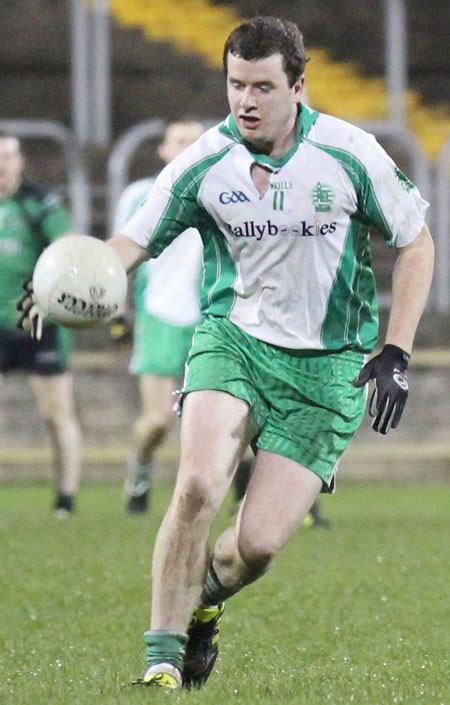 Action from the division three football league play-off match against Naomh Bríd.