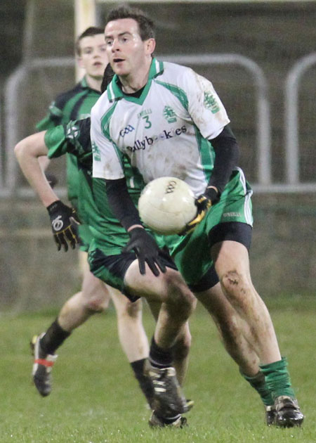 Action from the division three football league play-off match against Naomh Bríd.