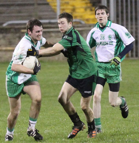 Action from the division three football league play-off match against Naomh Bríd.