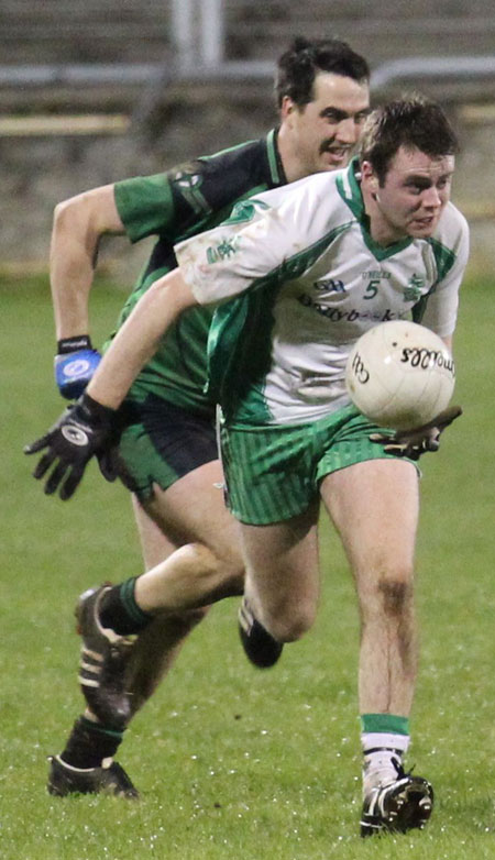 Action from the division three football league play-off match against Naomh Bríd.